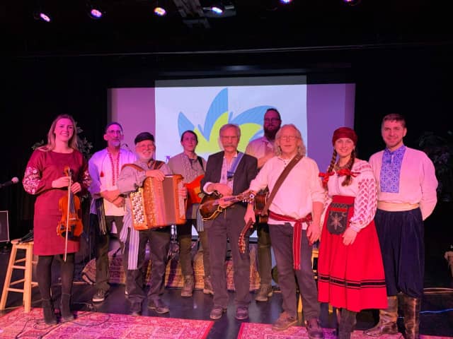 A group photo of the band at the Manluk Theatre